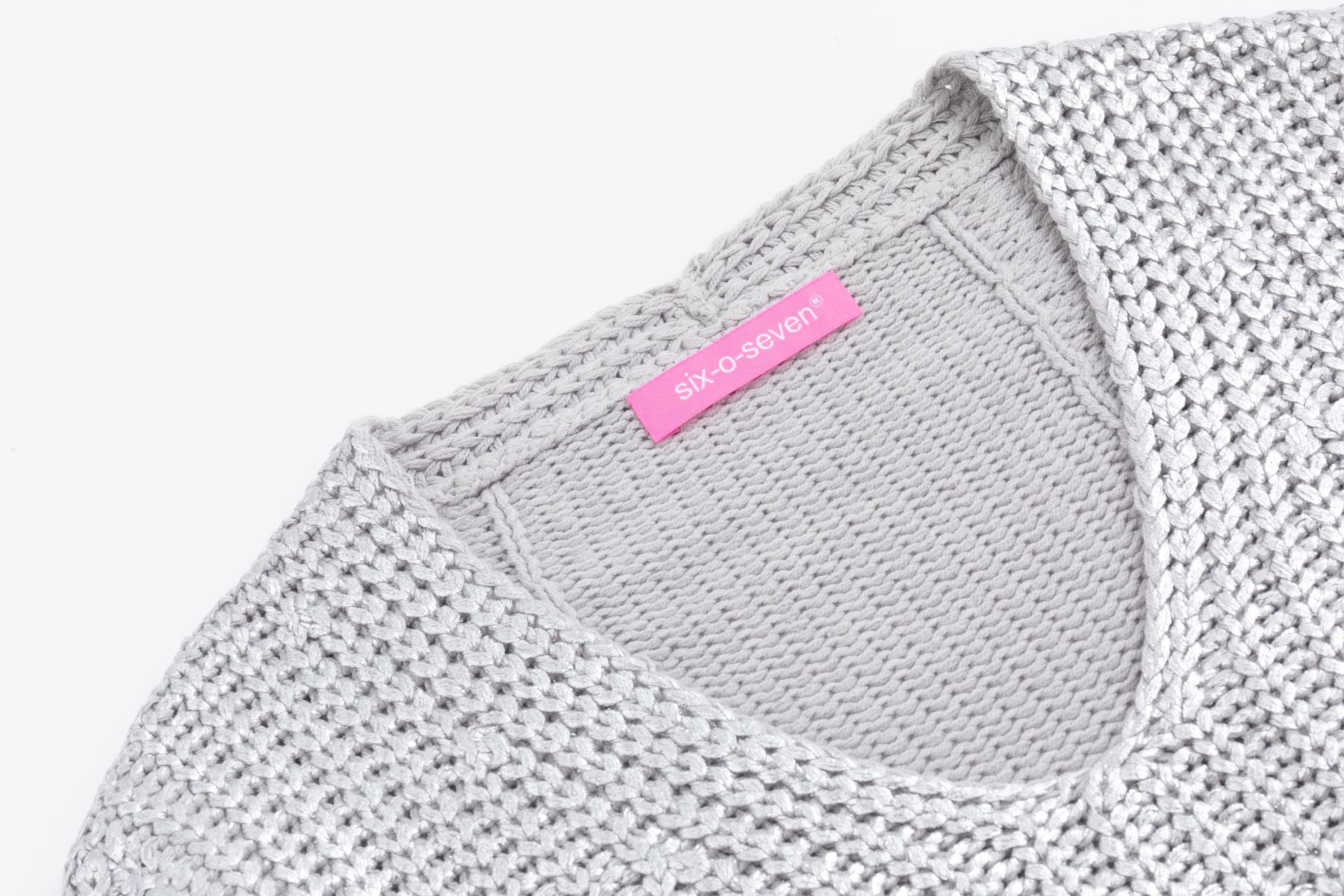Knitted sweater LIGHT GREY stitches distorted