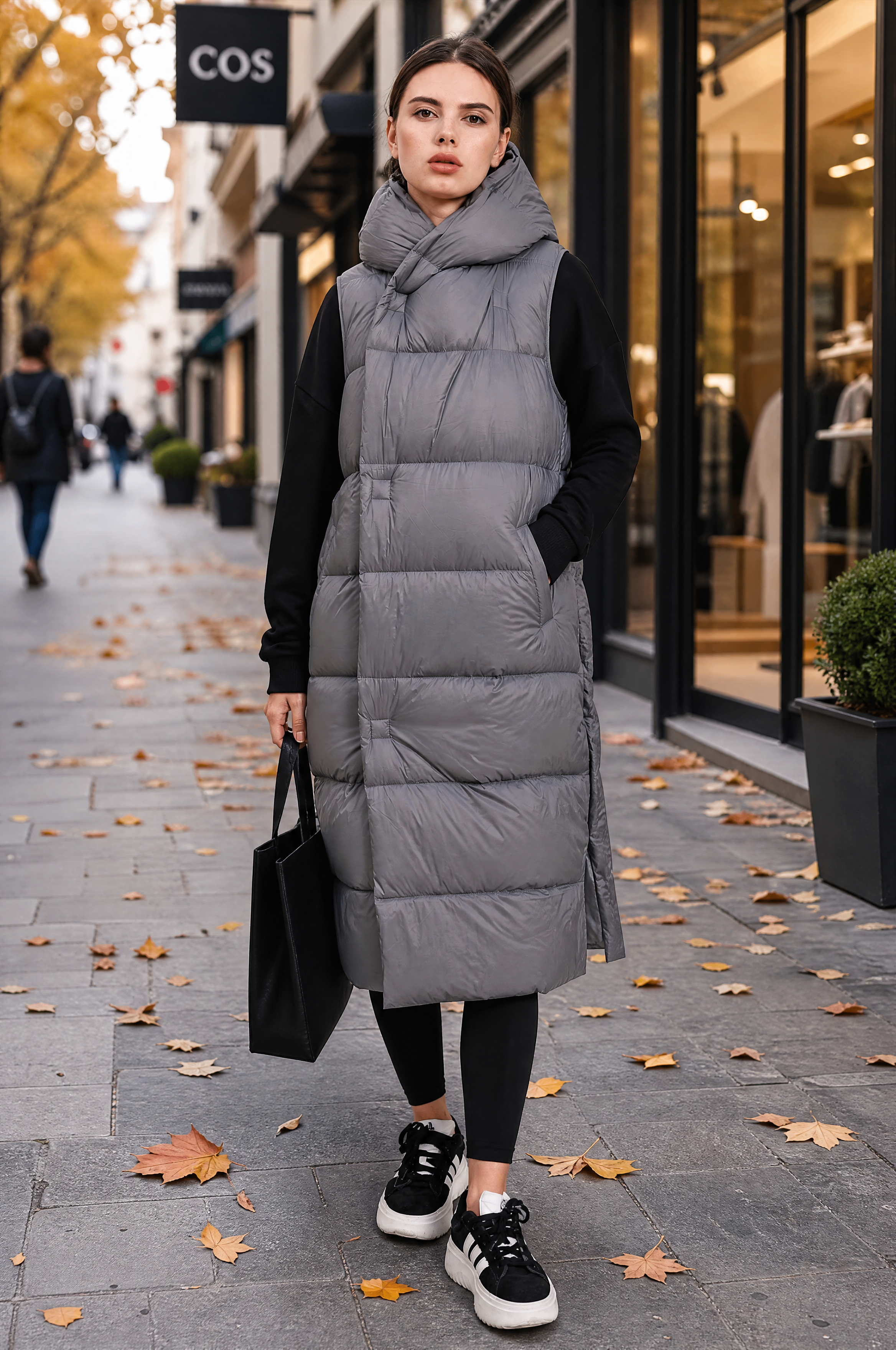 Lange Daunenweste mit Kapuze ideal Frühling moderner Stil