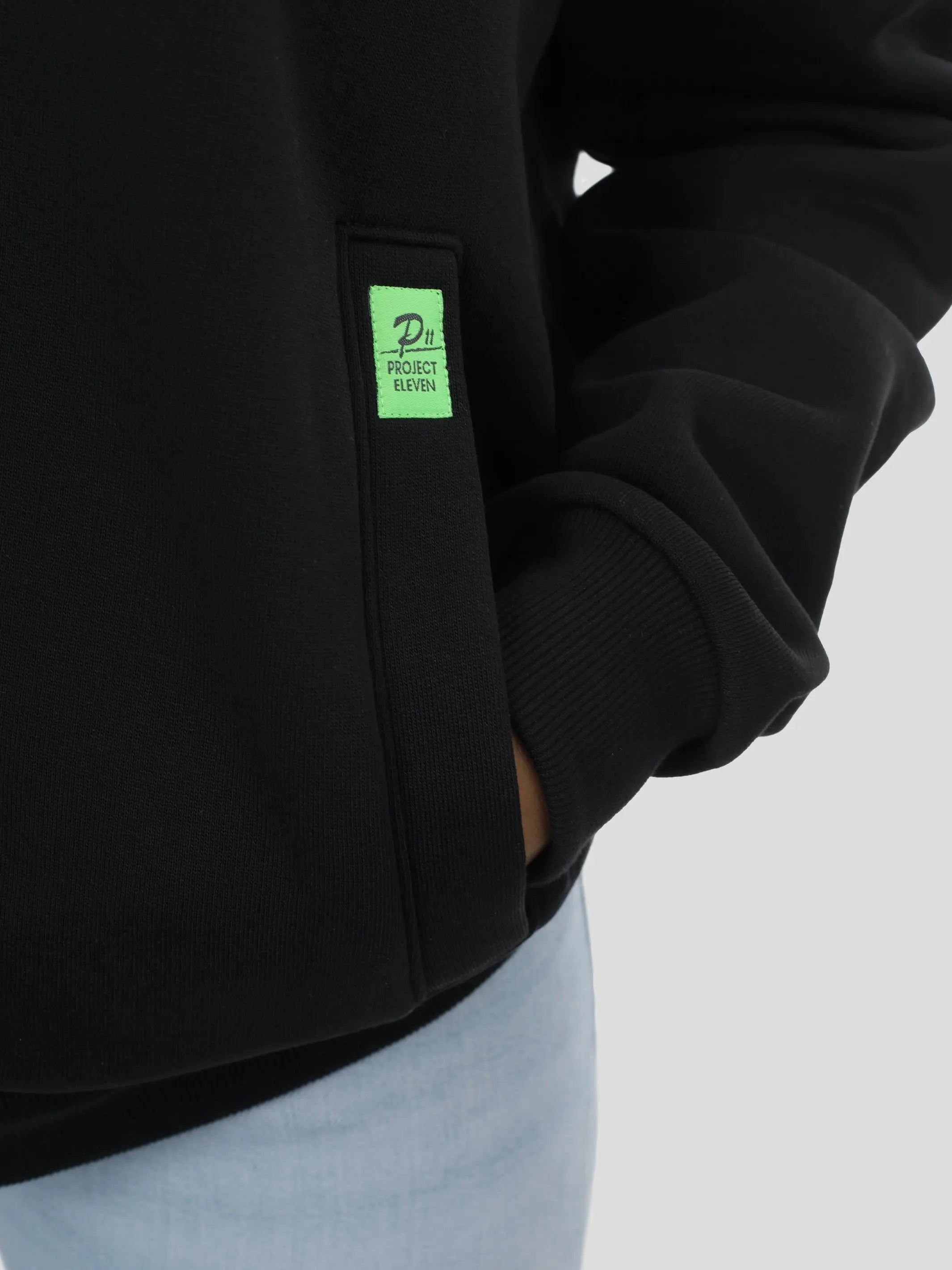 P11 Zip Hoodie Unisex in Schwarz project eleven
