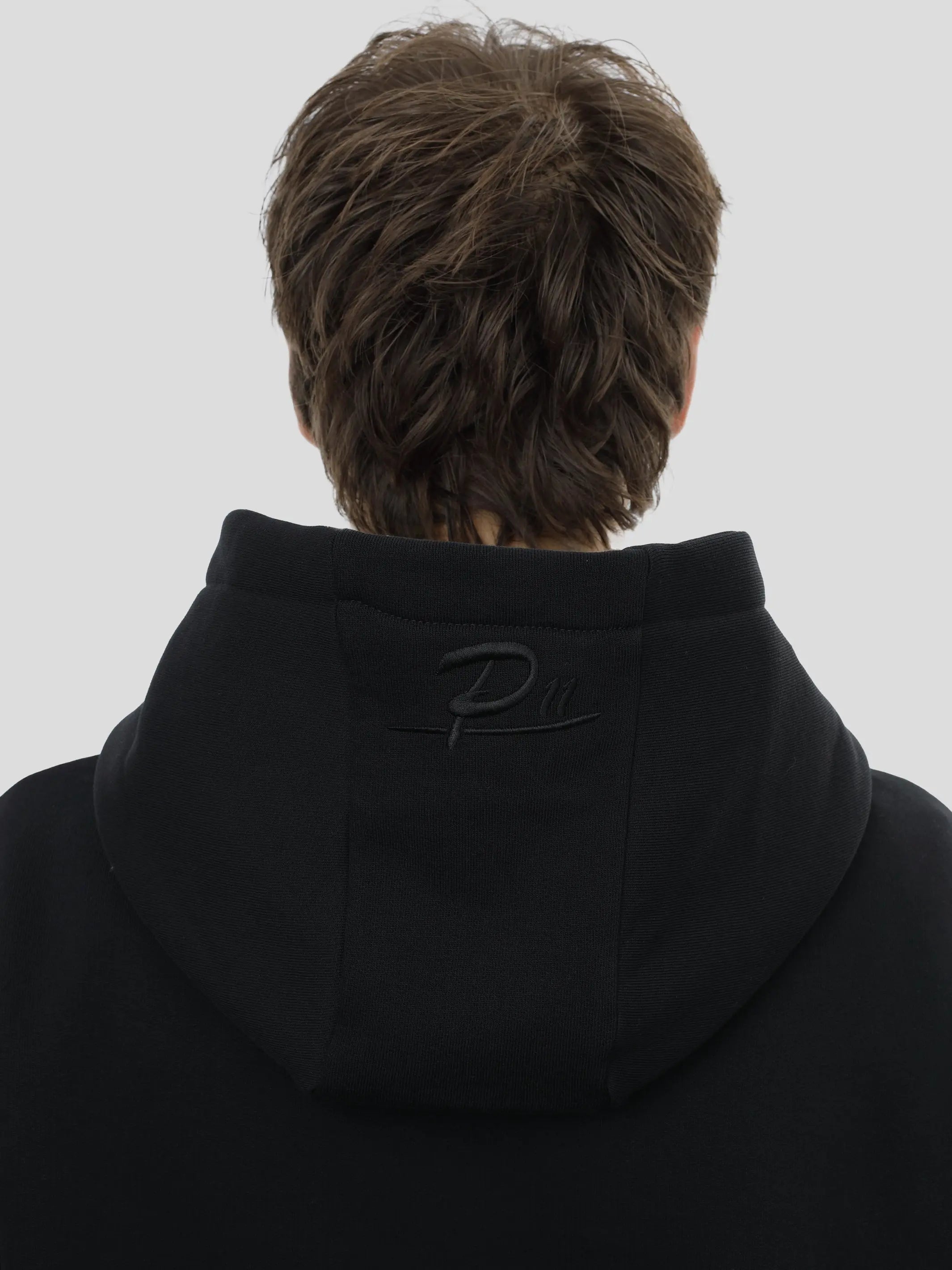 P11 Regular Hoodie Unisex mit großem Stick in Schwarz project eleven