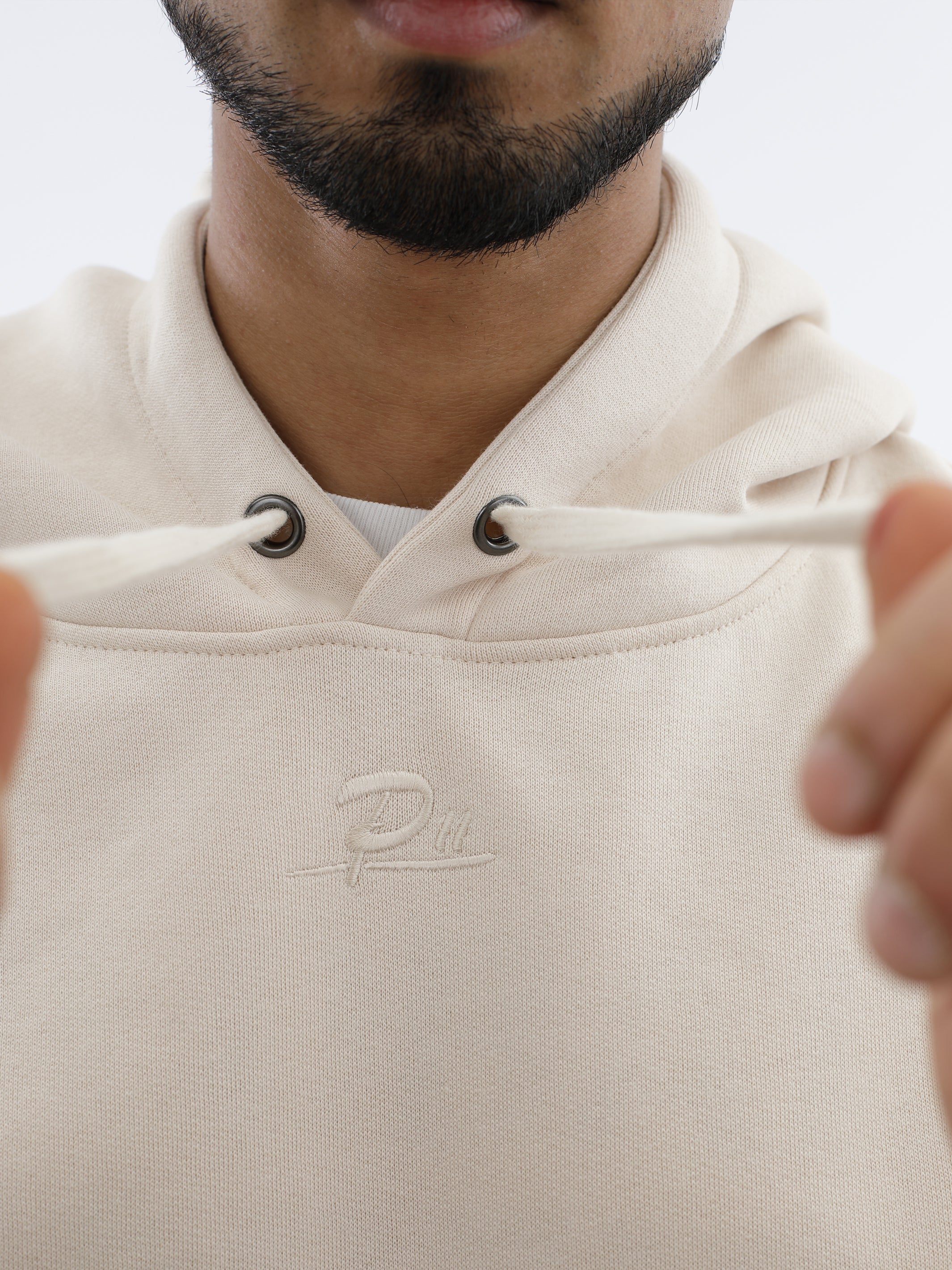 P11 Regular Hoodie Unisex mit kleiner Stickerei in Perfectly Pal project eleven
