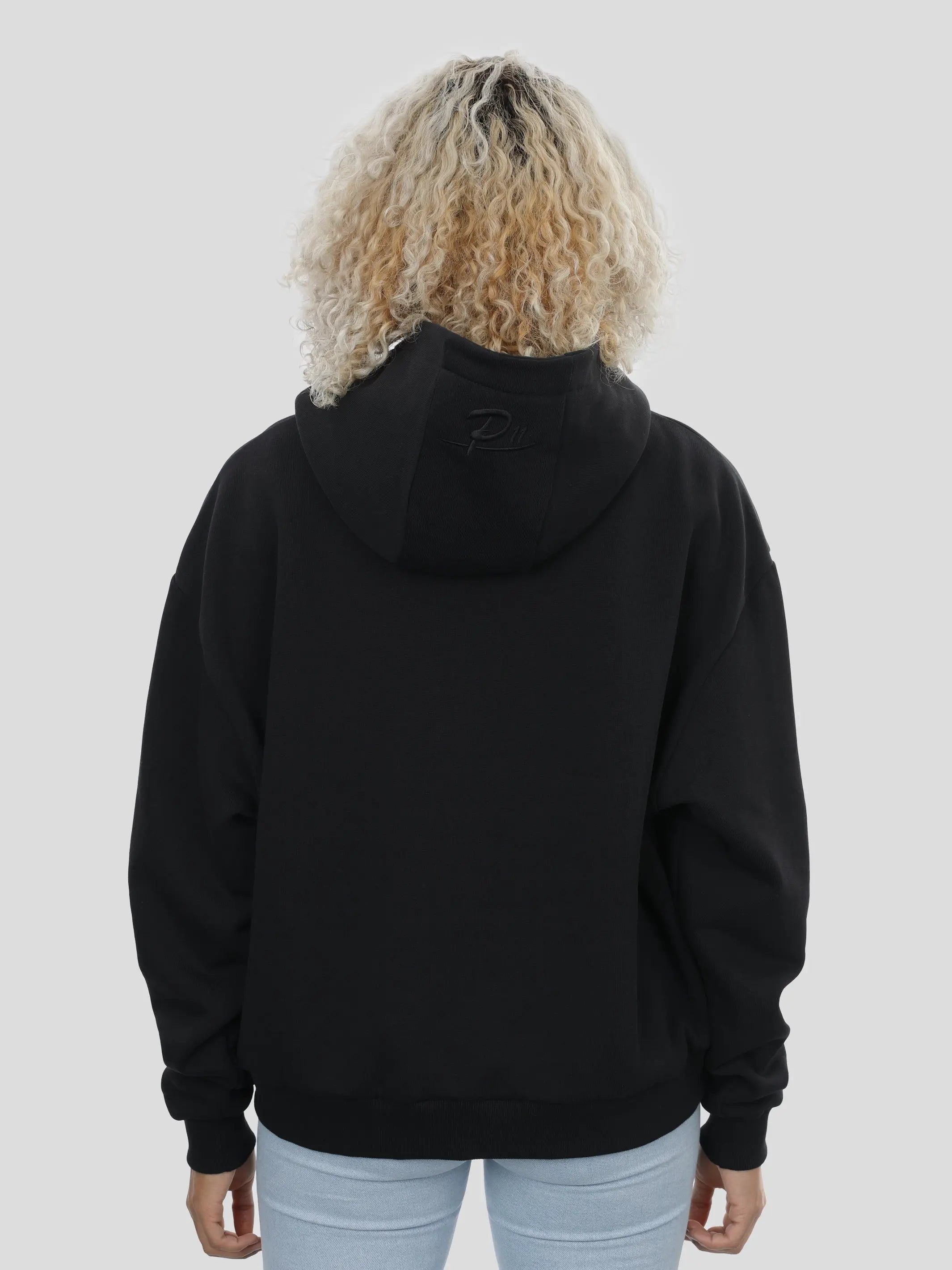 Boxy Hoodie Unisex mit Druck in Schwarz project eleven