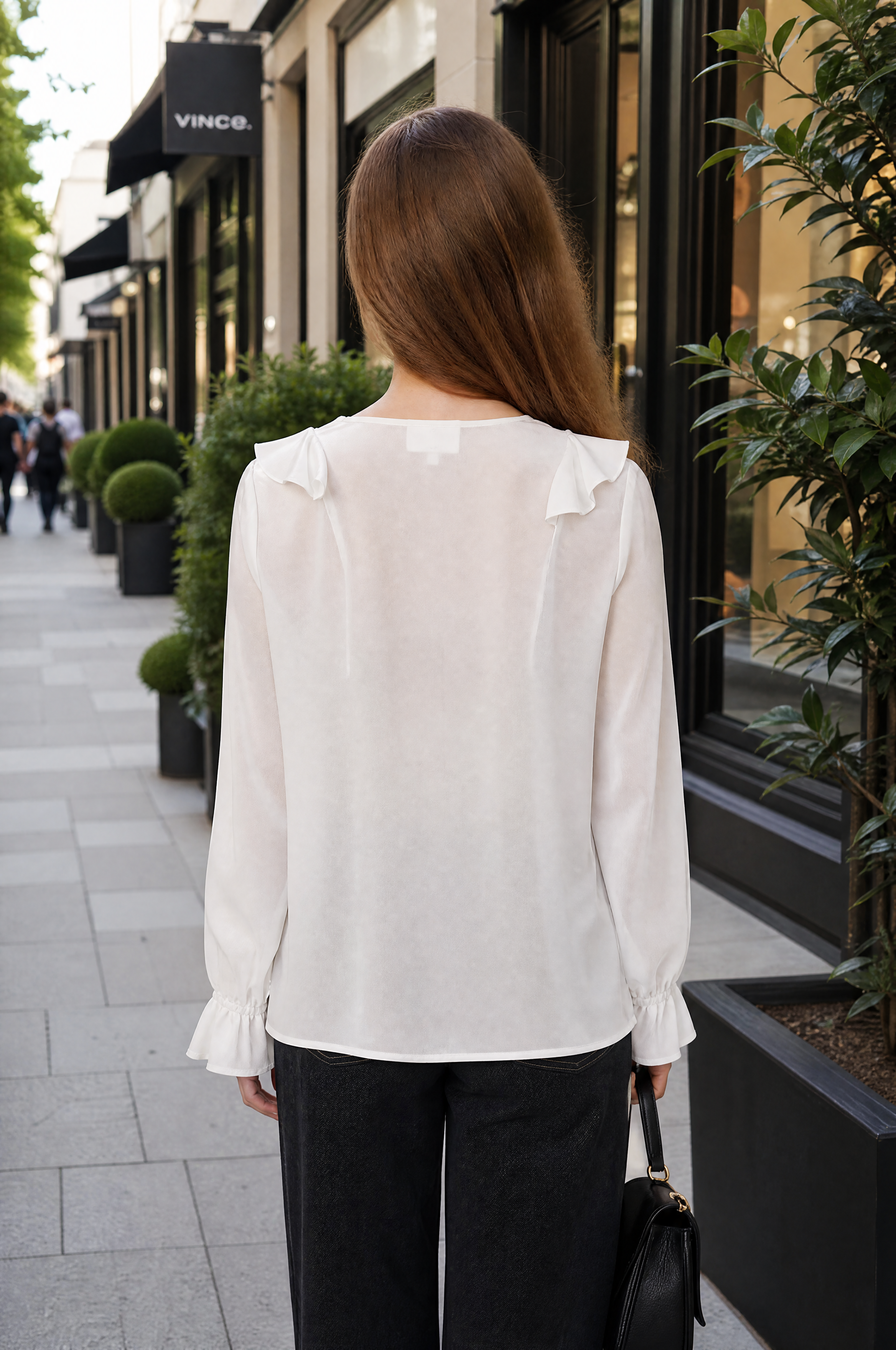 Spring silk blouse with a modern cut, ruffles and tie band