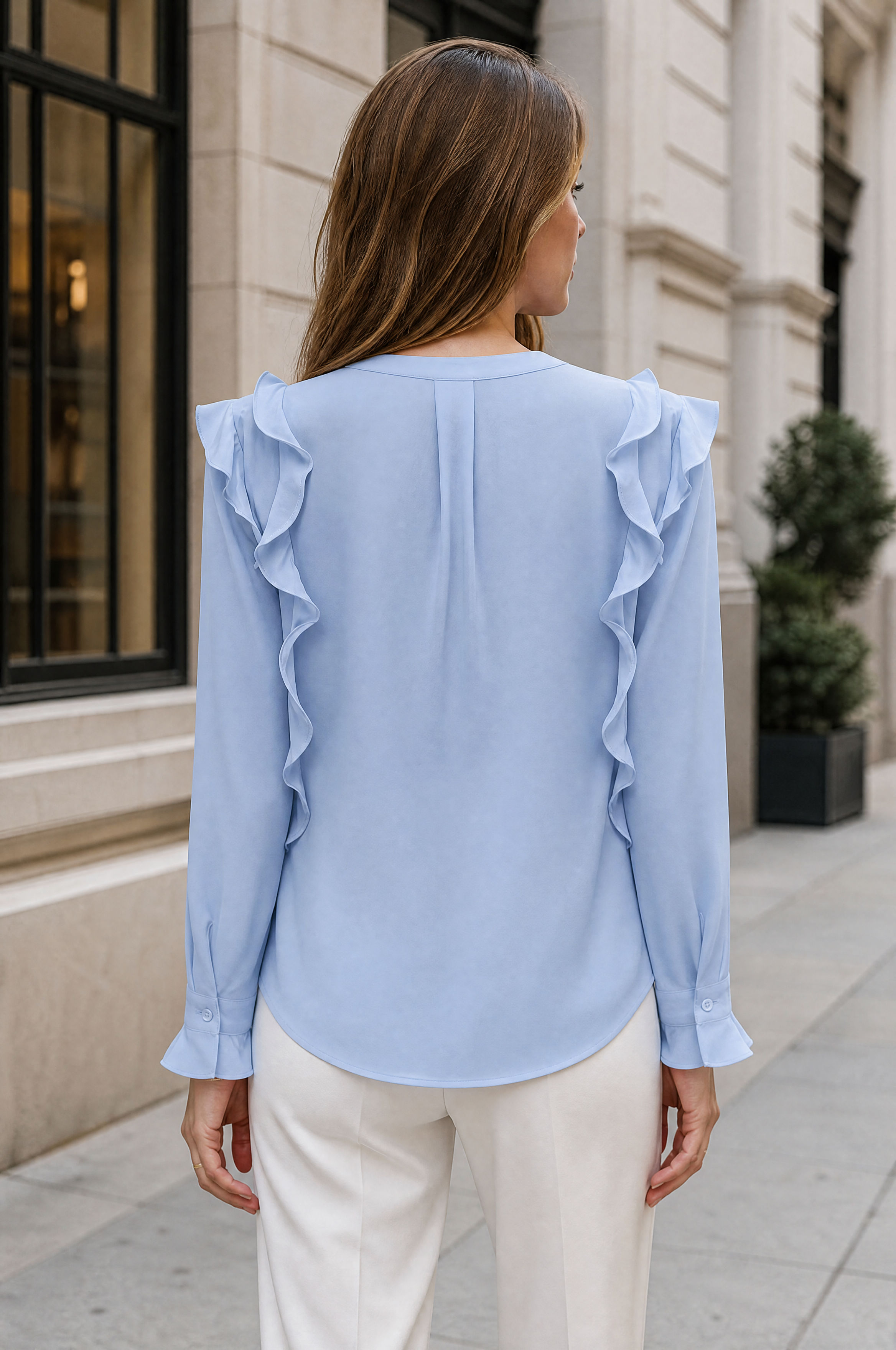 Summer silk blouse in elegant blue, modern style with ruffles