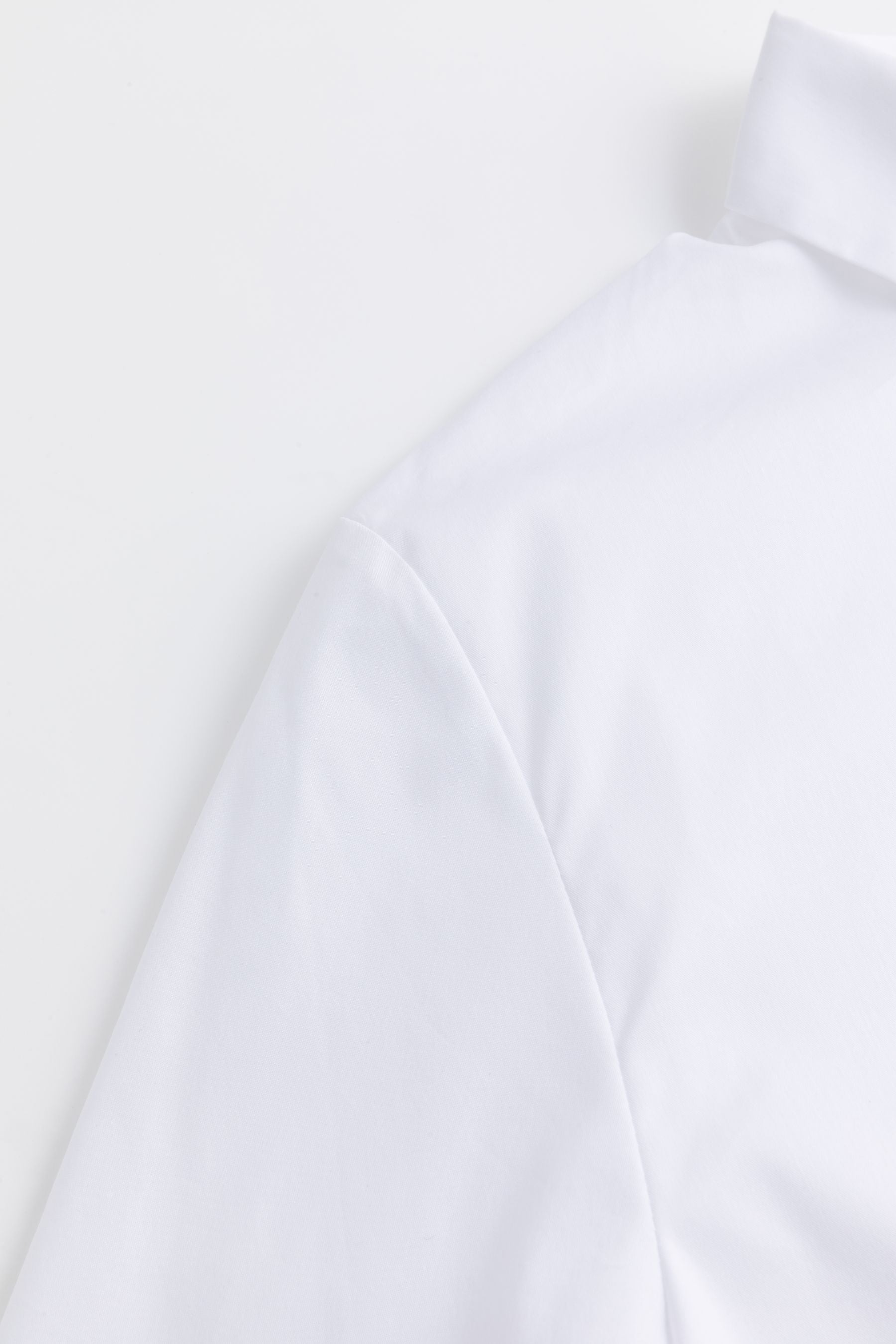 Elegant women's shirt in white with elegant buttons WHITE